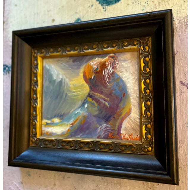 15”x13”x2” wood frame with decorative gold. 10”x8” painting. A sweet seal, sunning herself on the rocks. The emotion and...