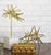 This tubular burst object with stone base will add a dynamic, sculptural pop to any tabletop arrangement. Beautiful...