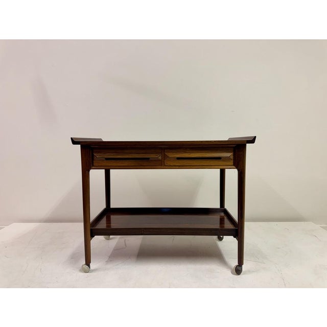 Rosewood Trolley by Torbjørn Afdal for Mellemstrands Møbelfabrik Bruksbo, Norway, 1960s A refined mid-century rosewood...