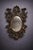 Antique louis xv style mirror, richly carved with scrolling foliage, shells, and other foliage motifs, typical of the...