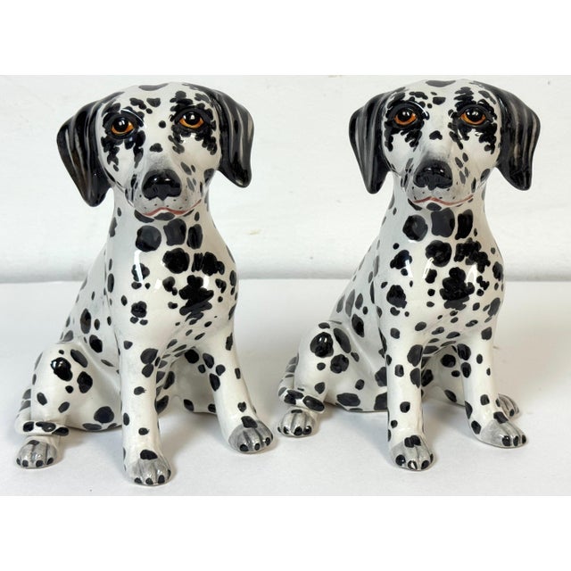 Pair of Italian Hollywood Regency Hand-Painted Pottery Dalmatian Puppies, Signed Italy, mid-20th century A charming pair...