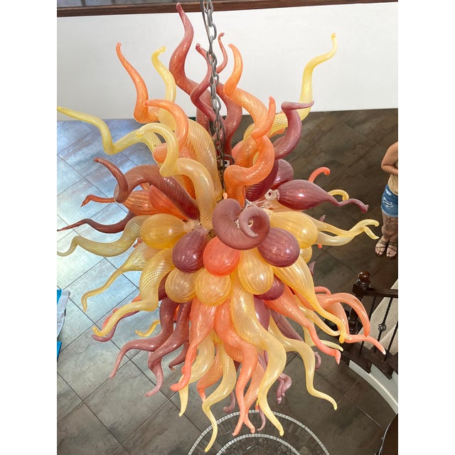 Dale Chihuly Hand-Blown Glass Chandelier This stunning, authentic Dale Chihuly chandelier is a breathtaking centerpiece...