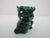 Chinese miniature Malachite temple dog or foo dog figurine. Hand-carved from vibrant green malachite stone featuring the...