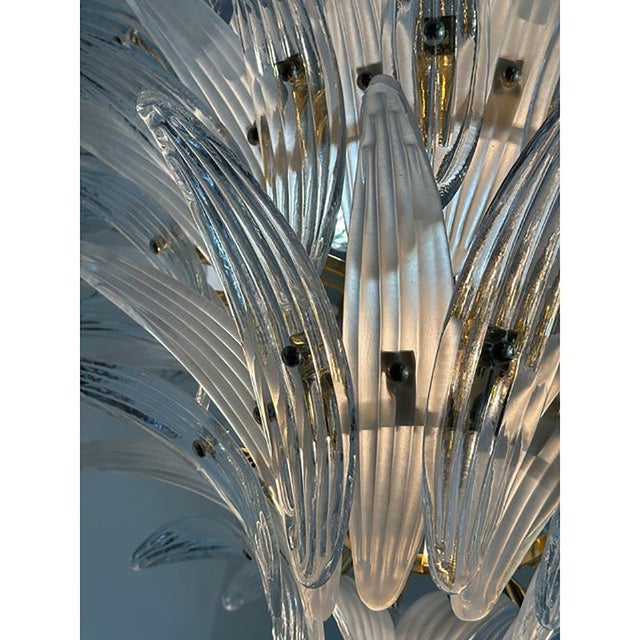 Huge impressive Gold 24k "palm" Murano Glass Chandelier. Scenographic chandelier made with "palmette" elements of...