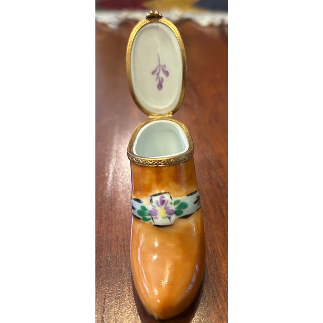 This is a genuine "Peint Main, Limoges France" hand-painted porcelain trinket box shaped like a Victorian-style shoe/boot,...