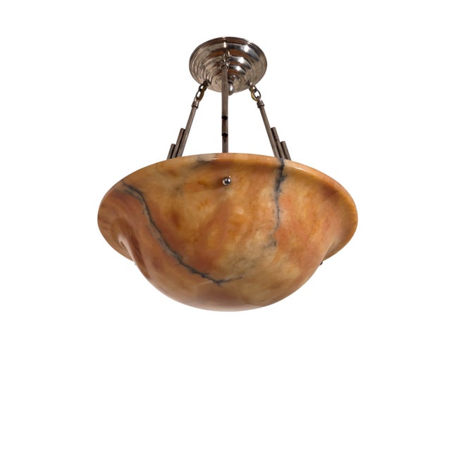 Elegant authentic Art Deco alabaster pendant light featuring a warm, honey‑amber toned carved bowl with dramatic veining...