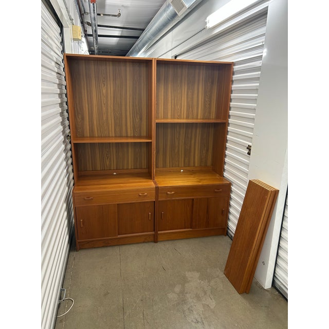 Can be used side by side as single cabinets. Very versatile with timeless design in beautiful teak from Denmark. Drawers...
