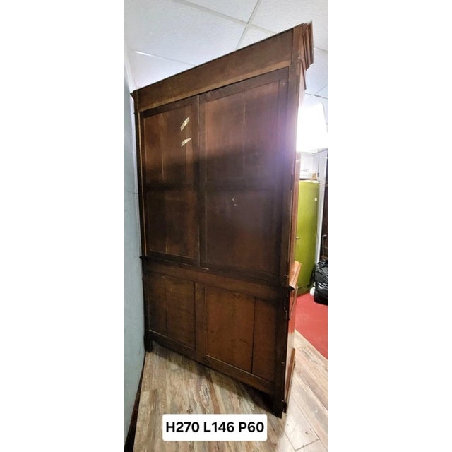 Louis philippe period mahogany cabinet-bookcase and secretary, circa 1830 front with four doors, two of which are glazed...