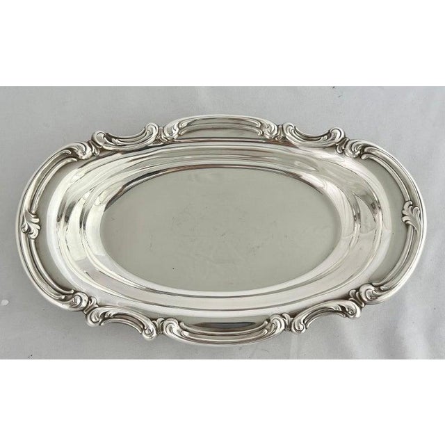 American Gorham silver plated serving dish with scrolled detail around the edge of the piece. It would be great to serve...