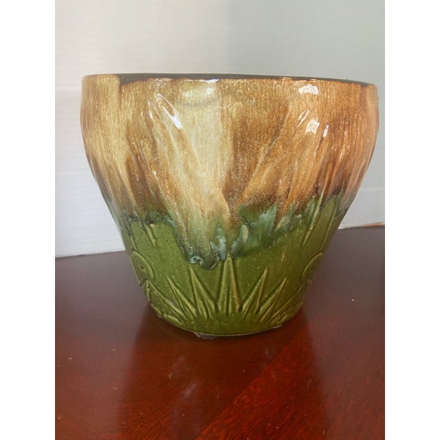 Large Robinson Ransbottom sun and moon jardiniere. Lovely hi-gloss glazes. Images of rising and setting sun molded into...