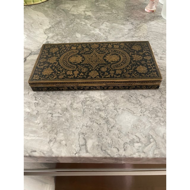 This stunning box is made of etched brass with black enamel overlay. Very ornate design with a middle eastern vibe. the...