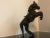 A small leather horse figurine made by hand from the 1950s. a beautiful horse covered with leather with a saddle with all...
