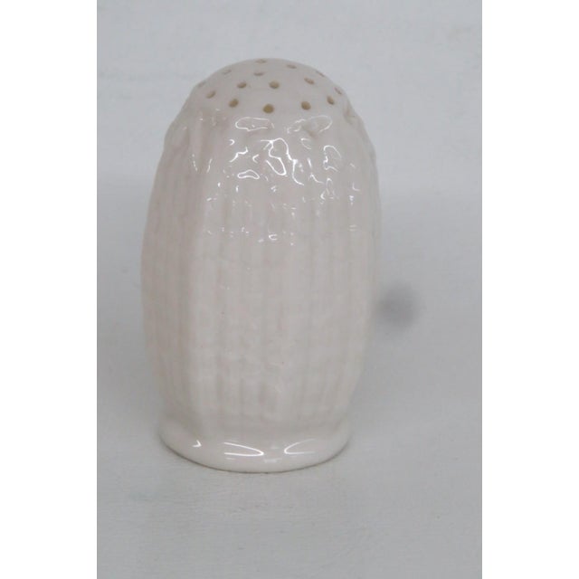 This highly charming Salt or Pepper Shaker is made of ceramic. The shaker presents a lovely cob shaped silhouette; it...
