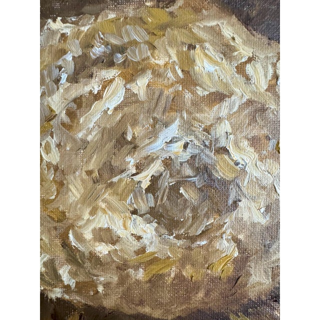 “Last Breath” is an original oil painting by Ari Chambers, capturing the fragile poetry of a bloom suspended between life...