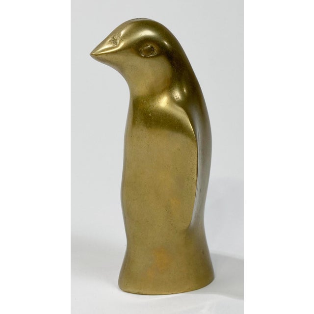 Vintage mid century modern style brass penguin figure. Clean lines and modern shape. Great as a decorative accessory or...
