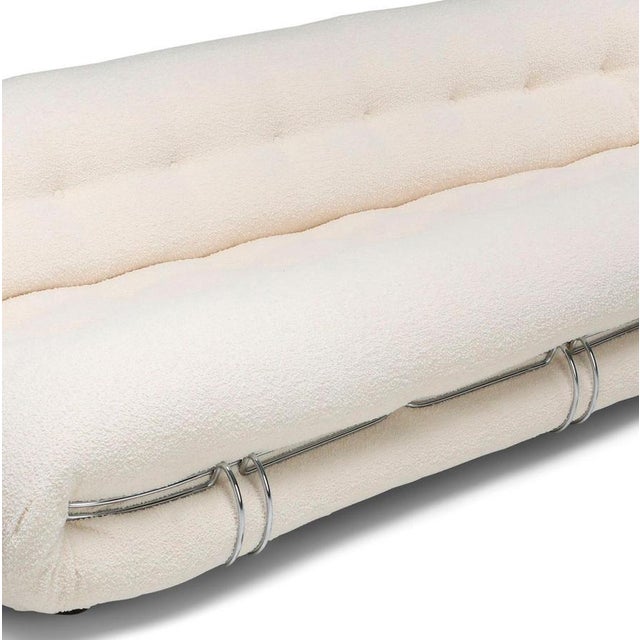 A design armchair with soft, generous contours, designed to bring home casual, sophisticated comfort that opens the door...