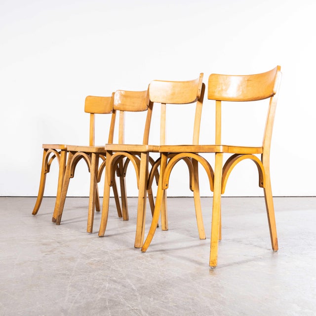 1950's Standard Single Bar Blonde French Mixed Dining Chairs - Good Quantities Available. - Set Of Four. This listing is...