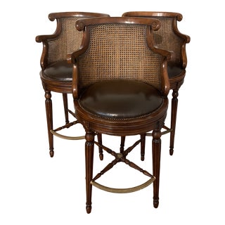 1990s Vintage Cane and Leather Swivel Stools - Set of 3 For Sale