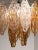 Beautiful atmospheric Vistosi chandelier with in Spaghetti style discs in mouth-blown glass threads, brown and opal. Metal...