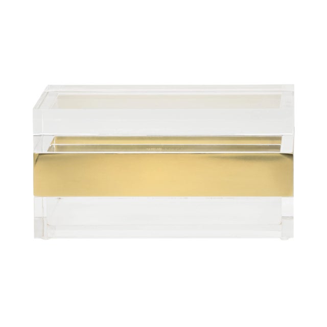 Crafted of acrylic, this decorative storage box is ideal for displaying your prized possessions. The brass band provides a...