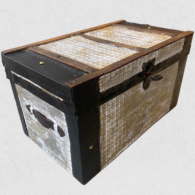 Restored antique doll trunk C 1890. Embossed tin exterior facings, new leather handles and original lining. This little...