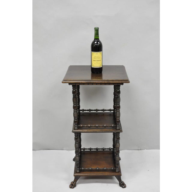 Antique American Empire Mahogany Carved Paw Foot 3 Tier Plant Stand Side Table. Circa Mid 20th Century. Measurements:...