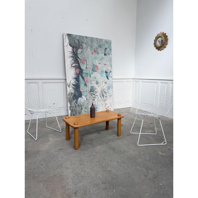 Vintage small rectangular coffee table with gentle curves and round legs: a modernist design in the style of Charlotte...