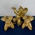 A striking trio of mid-century Hollywood Regency style cherub (putti) sculptures, ideal as a grand theatrical centerpiece...