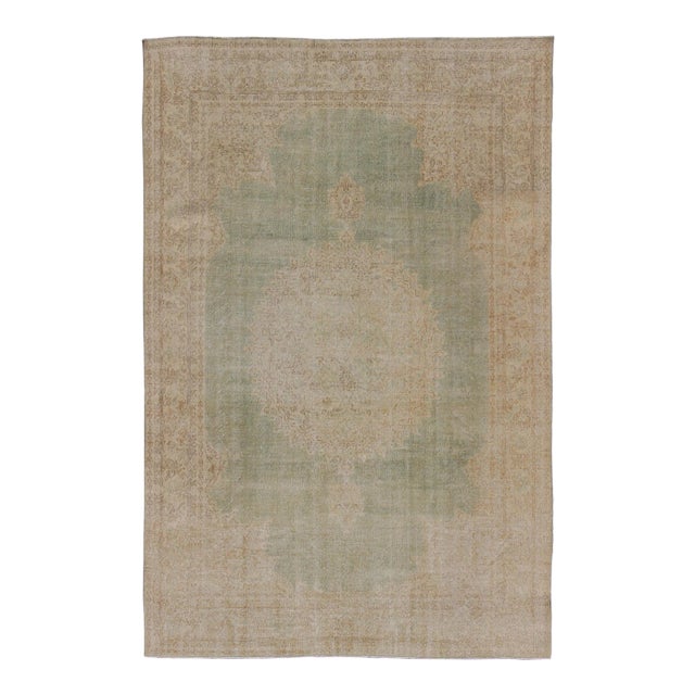 Distressed Turkish Rug With Floral Medallion in Light Green, Tan and Taupe For Sale