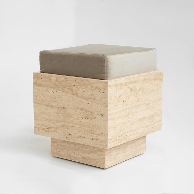 Discover the perfect blend of natural beauty and modern design with our Travertine Cube Stool. Featuring a travertine base...