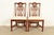 A gorgeous pair of Georgian or Chippendale style side chairs or dining chairs By Henredon USA, Circa 1980s Carved mahogany...