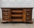 A traditional colonial style solid cherry long dresser with 9 dovetailed drawers and brass hardware by Pennsylvania House.