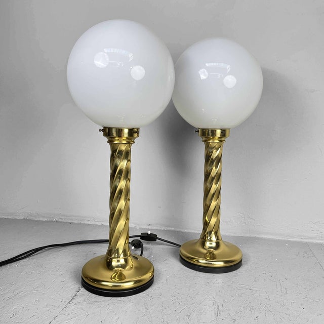 A beautiful set of gold table lamps designed in the luxurious Hollywood Regency style. Made by German company Rogo...