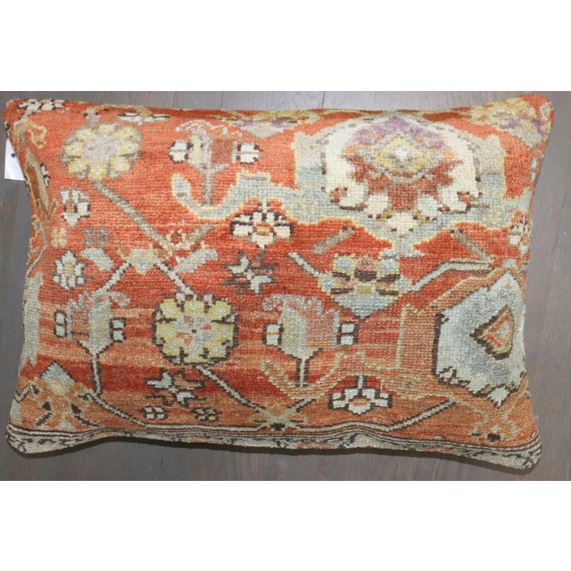 Pillow made from an early 20th-century Antique Persian Rug. Zipper closure and poly-fill provided. Measures: 16'' x 123''