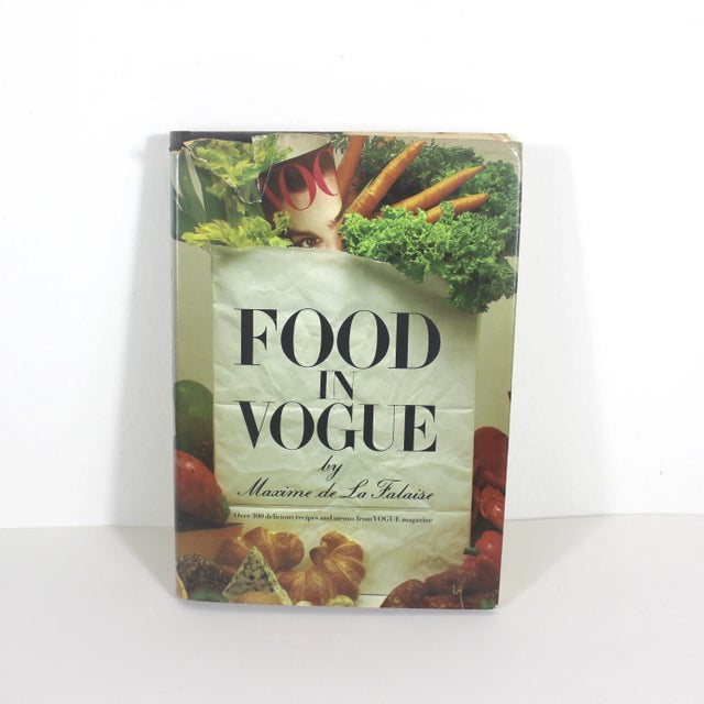 1981 Food in Vogue Hardcover vintage cookbook with dark blue linen cover and gold lettering. Includes dust jacket.