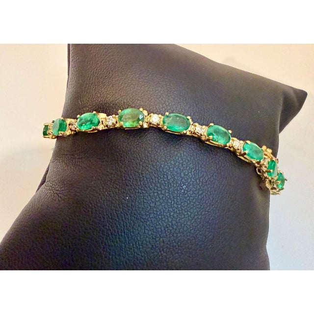 This exceptionally affordable Tennis bracelet has 19 stones of oval Emeralds . Each Emerald is spaced by one diamonds ....