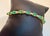 This exceptionally affordable Tennis bracelet has 19 stones of oval Emeralds . Each Emerald is spaced by one diamonds ....