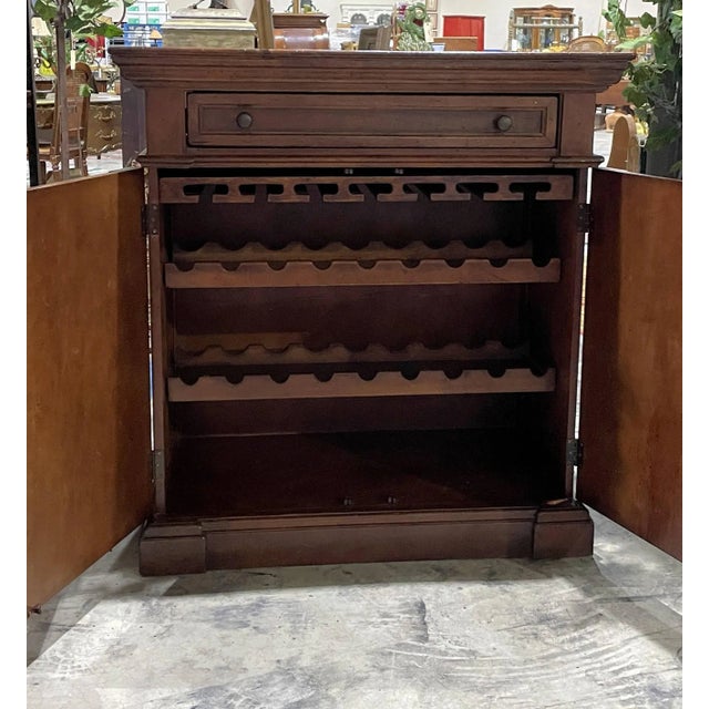 Vintage European Inlaid Wood Wine Storage Cabinet. Features old-world styling with one dovetailed drawer and two doors....