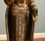 Impressive Burmese giltwood standing Buddha statue, circa 1950, finely carved and richly decorated in the traditional...