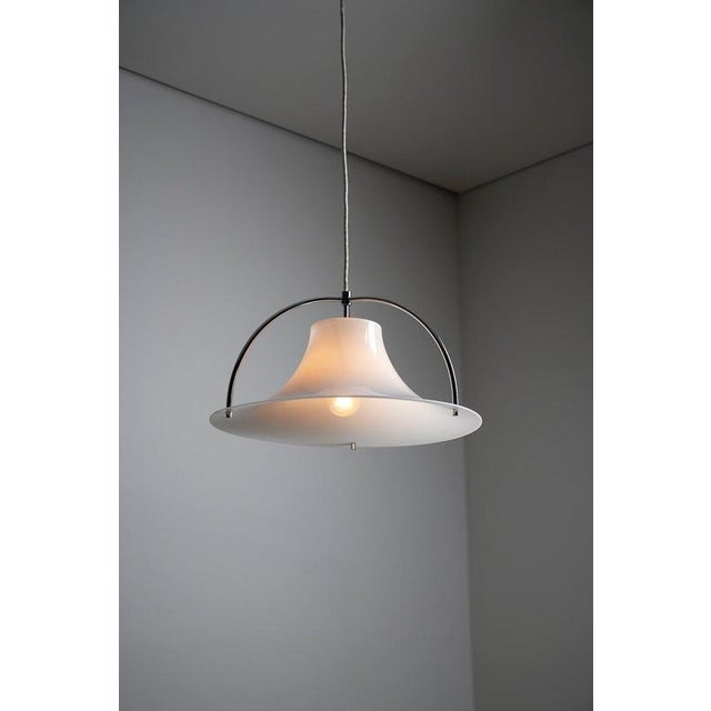 “single” pendant light designed by jo hammerborg for fog & mørup, denmark, dating from the 1970s. The fixture combines a...