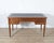Elegant 19th-century Louis XVI–style mahogany flat desk, double-sided and richly detailed in the refined neoclassical...