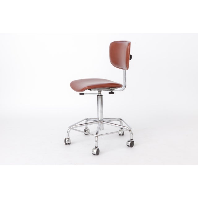 Vintage swivel chair by Bremshey & Co., Germany, dating from the 1970s–1980s. The chair features a sturdy chrome-plated...