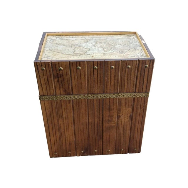 An exquisite mid-Century Walnut and Brass Decorated Portable 6-bottle Wine Cellarette that will make a distintive...