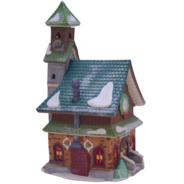 Porcelain lit North Pole Chapel from the Christmas holiday Dept. 56 North Pole Series of the Heritage Village Collection...