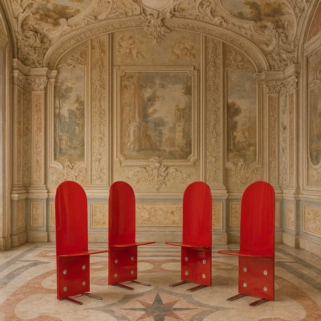 An extraordinary set of four red lacquered pellicano chairs, designed by luigi saccardo for arrmet and published in domus...