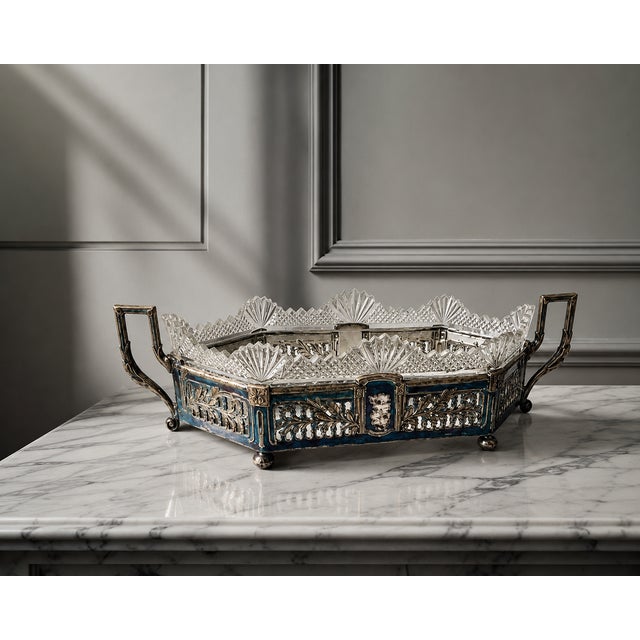 A refined french silver-plated planter or centerpiece, dating to around 1900, characterized by its elongated architectural...
