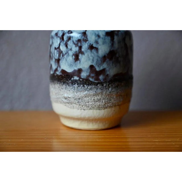 This lovely vase is a 1970s production from the VEB Haldensleben factory. Its decorative design reveals beautiful...