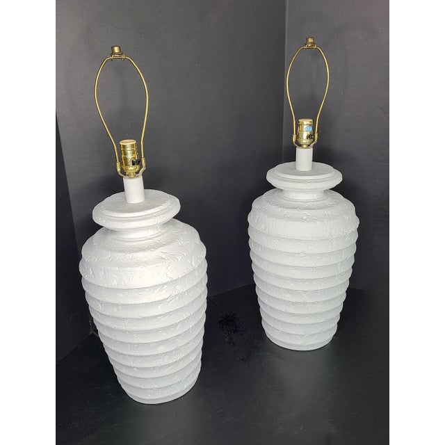 Excellent pair of plaster Alsy lamps in white, perfect for a postmodern or mid century decor. Measures 30" to the top of...