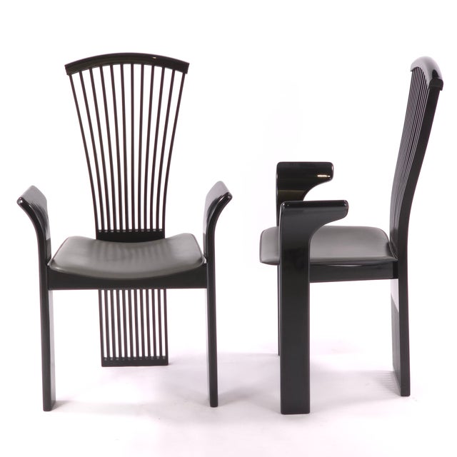 Designer Pietro Constantini's iconic "fan" chairs epitomize Italian Post-Modern Design. It is rare to find a complete set...