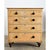 This English chest of drawers from the 19th Century is built from solid pine with a faux bois finish to imitate birdseye...